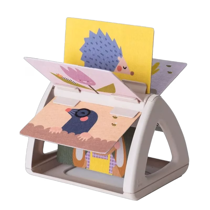 Taf Toys magträningsleksak Tummy-time spinning book
